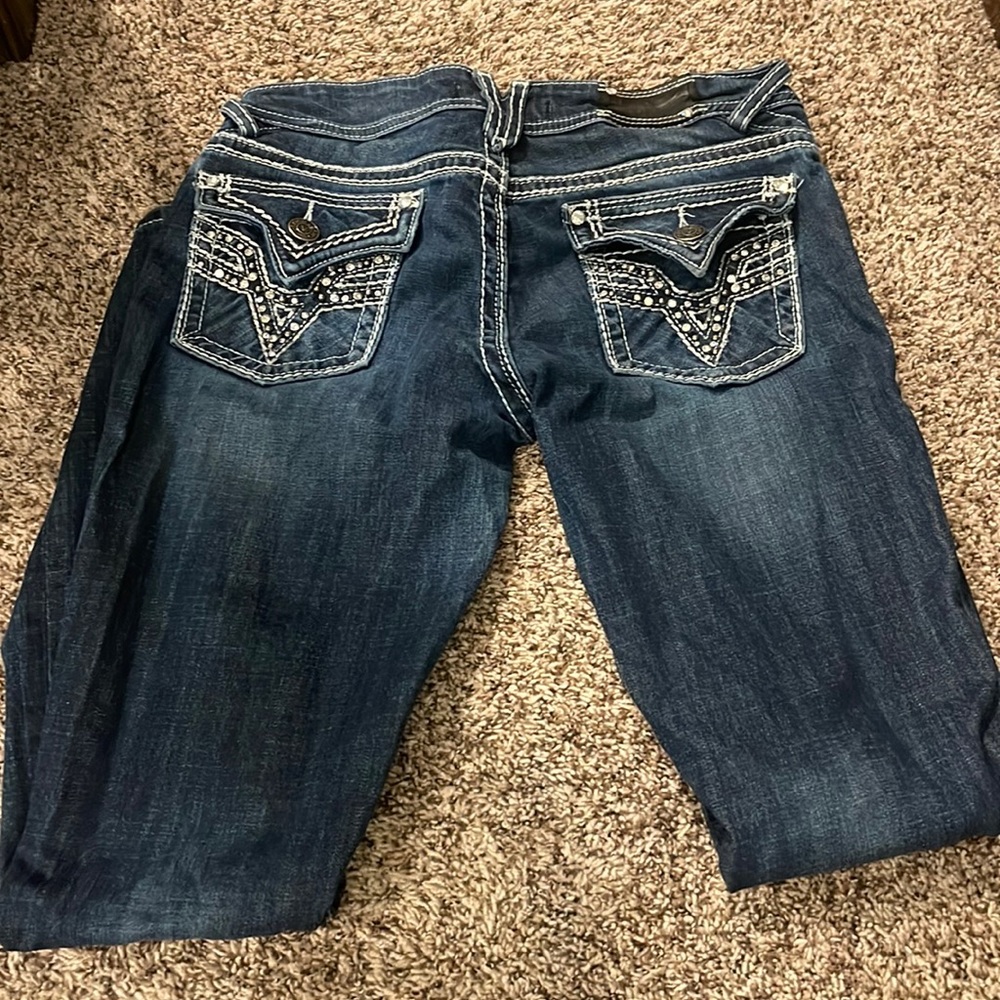 Vigoss jeans bottoms are ripped a little